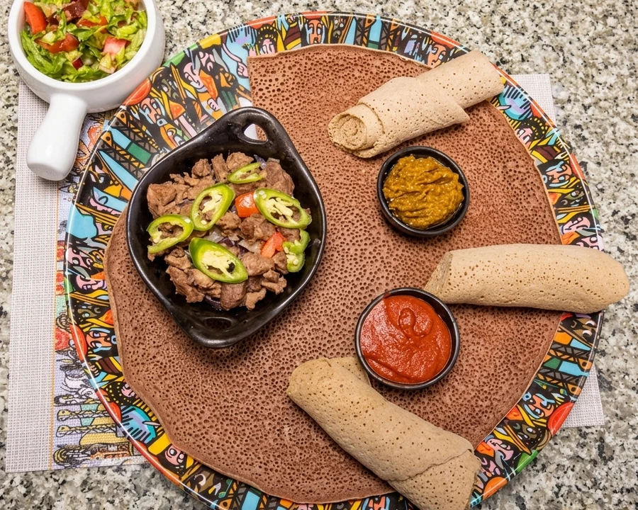 Vegetarian Ethiopian combination platter with lentils and greens at Rimyya Friendship Bar and Restaurant Winnipeg